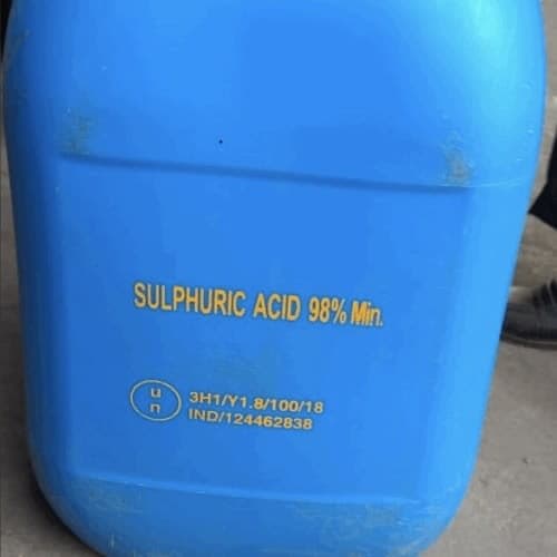 Blue jerrican stencilled sulphuric acid 98% minimum, UN-marked for transport.