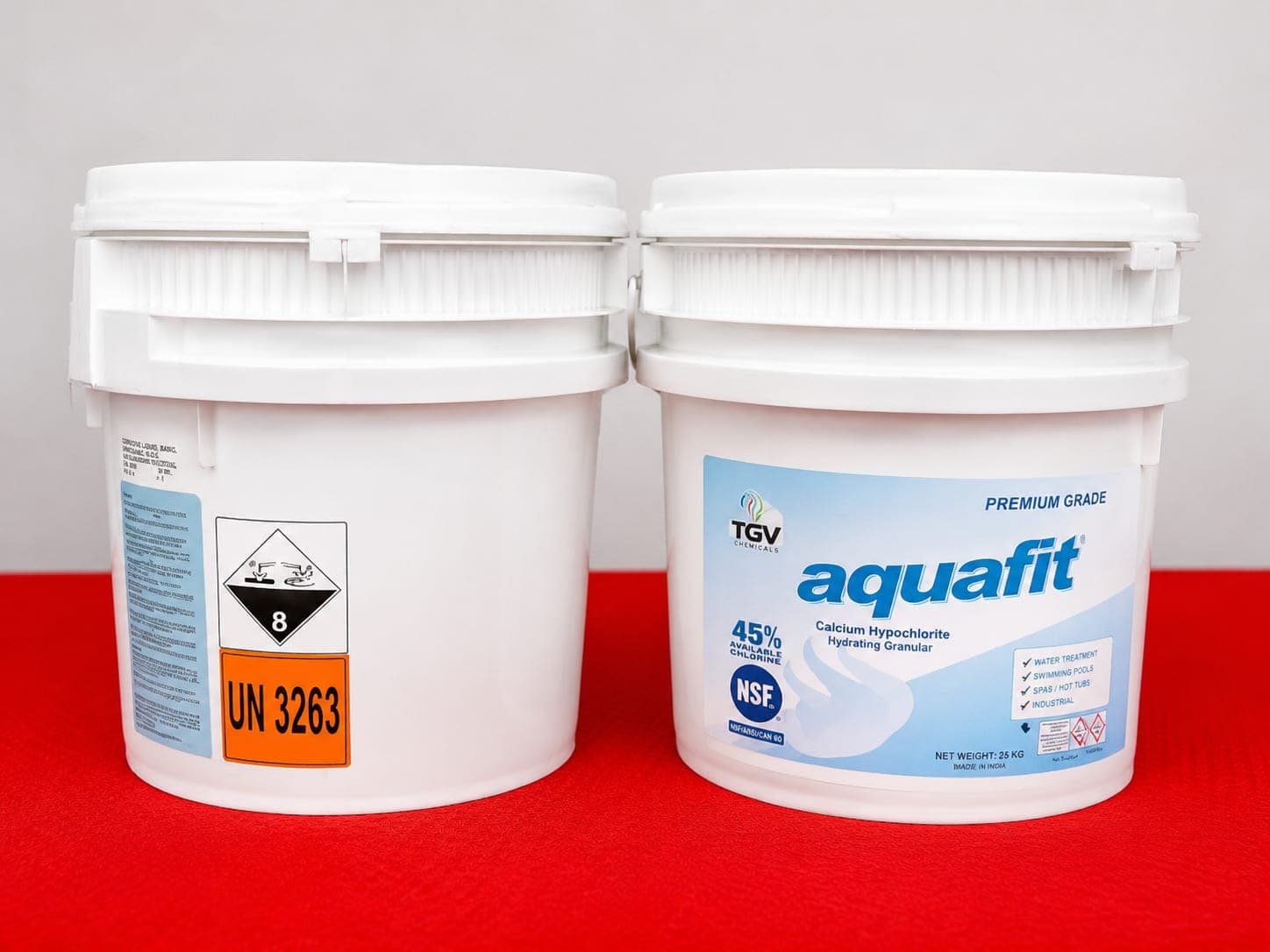 White plastic tubs of hydrating calcium hypochlorite pool granules, UN 3263.