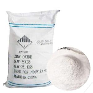25 kg sack of zinc oxide for industrial use beside a heap of the white powder.
