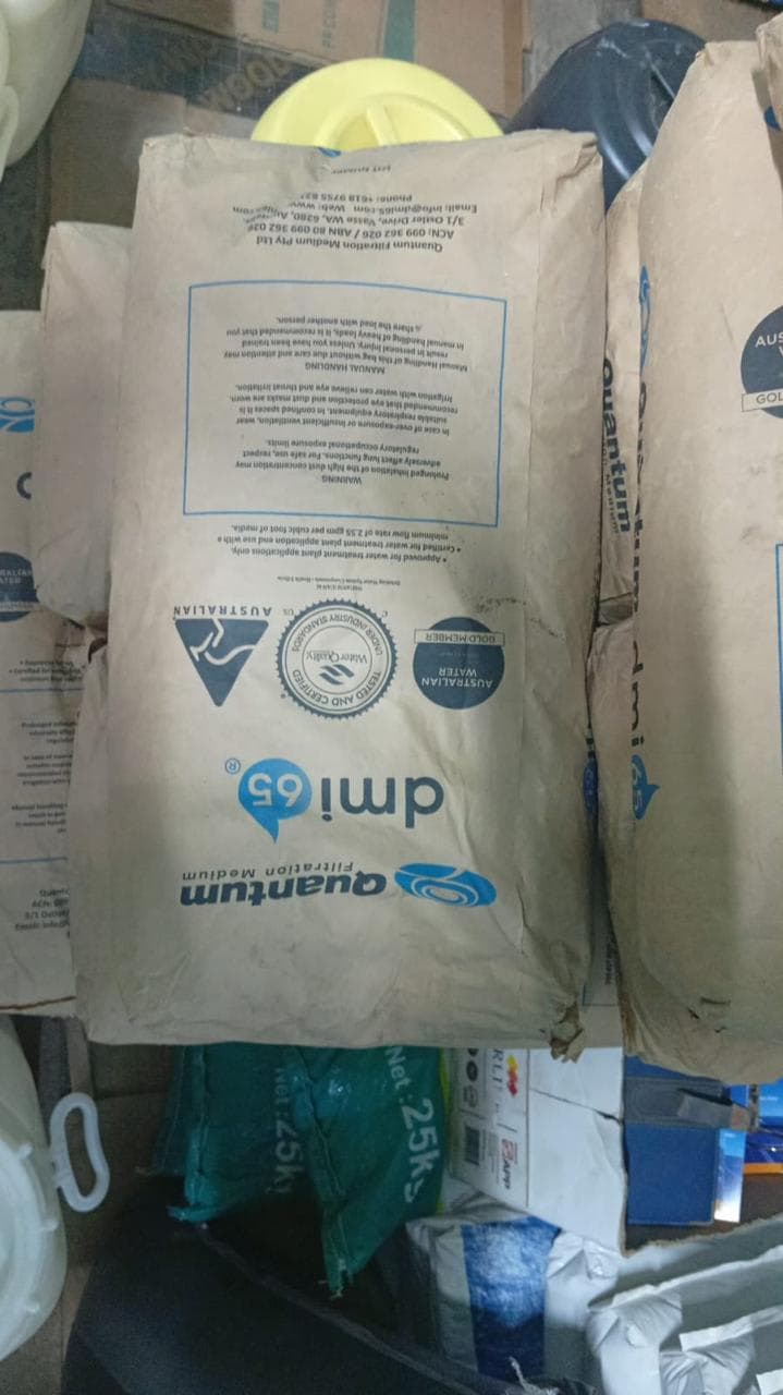 Sack of Quantum DMI-65 catalytic filtration medium for water treatment plants.